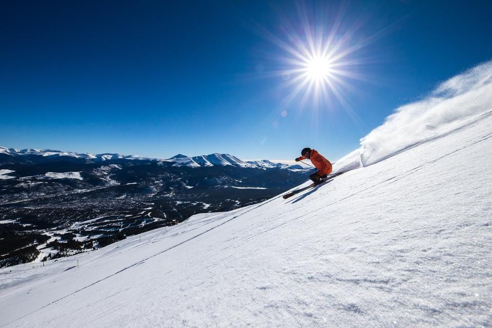 Man skiing a steep slope in Breckenridge
