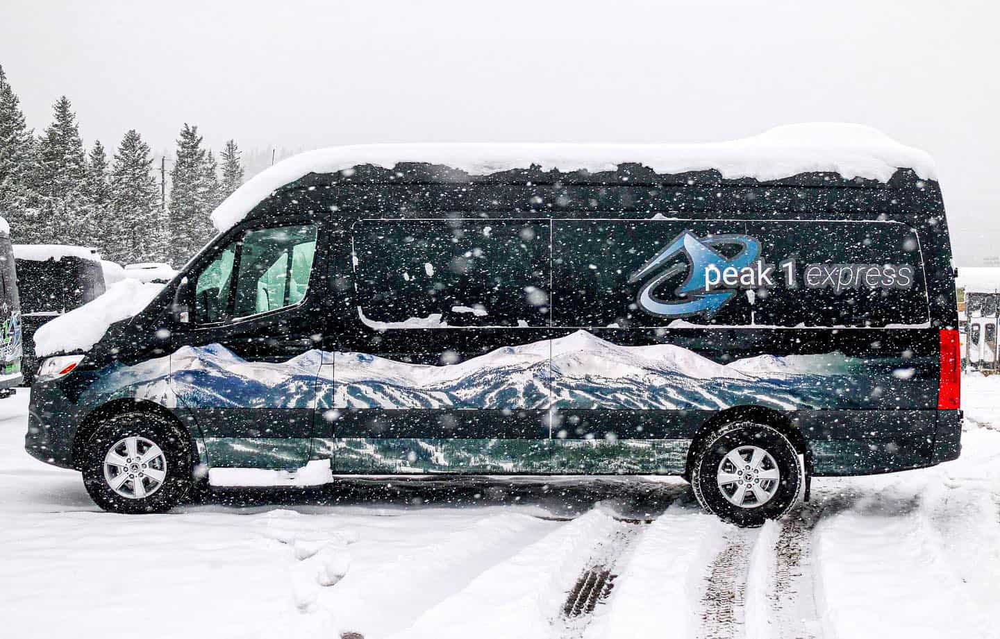 Peak 1 Express shuttle covered in snow in Breckenridge