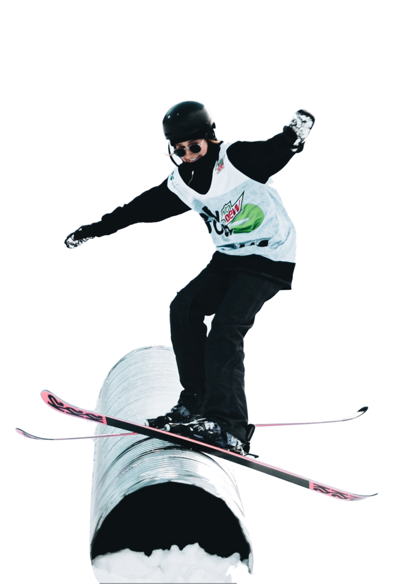 Skier hitting a rail on demo skis